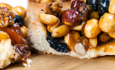 crispy tartlet with hazelnuts, peanuts and other ingredients