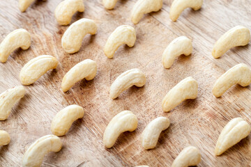 fresh raw cashew nuts on the kitchen table