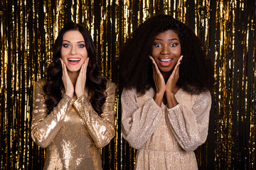 Photo of impressed brunette ladies hands face wear nice dresses isolated on bright gold color background