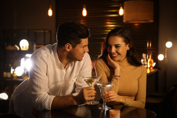 Man and woman flirting with each other in bar
