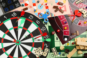 Different types of board games and its' components as background, top view