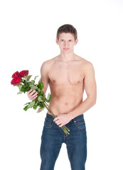sexy young man with naked torso and bunch of a red roses on a white background