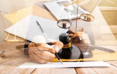 Business and lawyers discussing contract papers with brass scale on desk in office. Law, legal...
