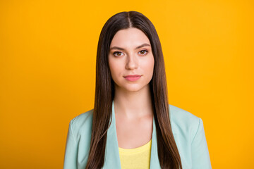Fototapeta premium Portrait of young attractive lovely pretty serious businesswoman in blue jacket look camera isolated on yellow color background