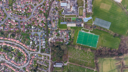 Aerial drone photo of the Silcoates School and Schools football pitches and playing field in the British town of town of Wrenthorpe in Wakefield in the UK in the Spring time