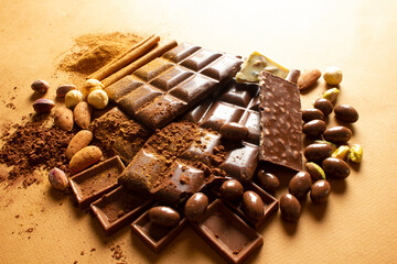  milk chocolates. Almond, pistachio, hazelnut.. background, texture..