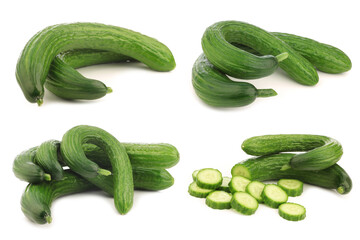 bunch of curly turkish cucumbers and some cut pieces on a white background