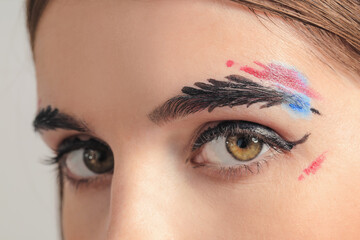 Fototapeta premium Beautiful woman with creative eyebrows, closeup