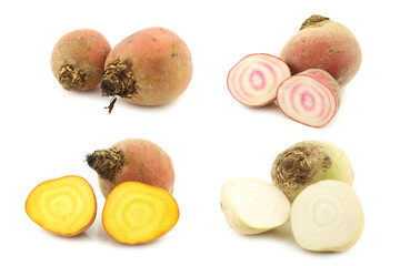 colorful mix of red,yellow and white beets and some cut ones on a white background