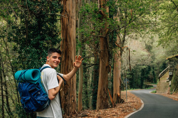 young man enjoying hiking or trekking