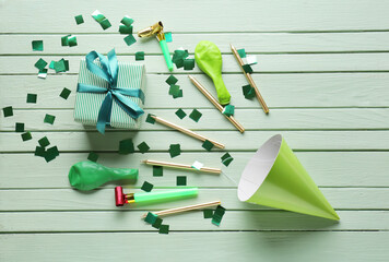 Composition with party hat on color wooden background