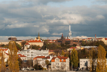 Naklejka premium Prague cityscape with view of Zizkov TV tower and maternity hospital of Saint Apollinare, Czech Republic 