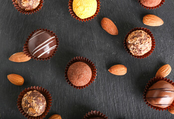 Sweet chocolate candies on dark background