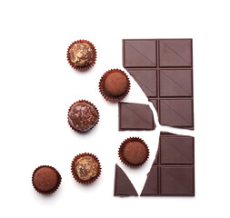 Sweet chocolate and candies on white background