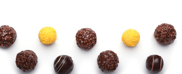 Sweet chocolate candies on white background