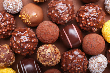 Sweet chocolate candies as background