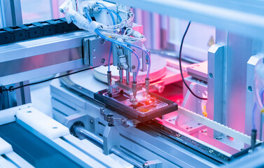 robot with vacuum suckers with conveyor in manufacture phone factory,Smart factory industry 4.0 concept.