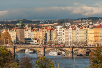 View of Masaryk Embankment with Sitkovska water tower, Dancing House and Palackeho Bridge in Prague, Czech Republic