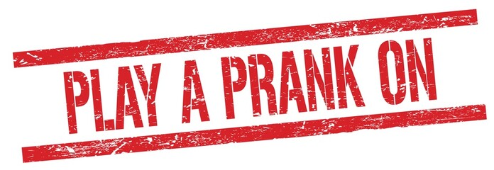 PLAY A PRANK ON text on red grungy rectangle stamp.