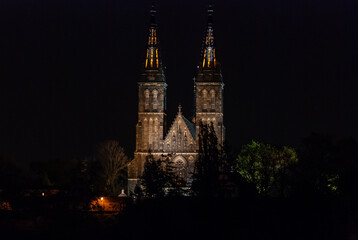 Obraz premium View of Vysehrad Castle and Basilica of St. Peter and Paul in Prague, Czech Republic, illuminated at night