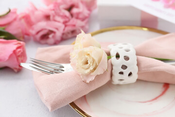 Beautiful table setting on light background, closeup