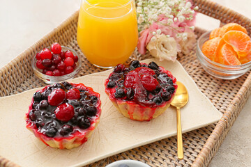 Tasty breakfast on wicker tray