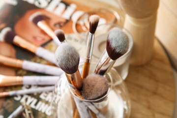 Set of makeup brushes in holder, closeup