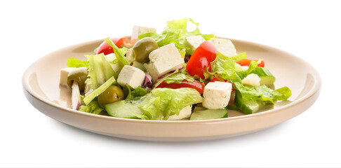 Plate with fresh Greek salad on white background