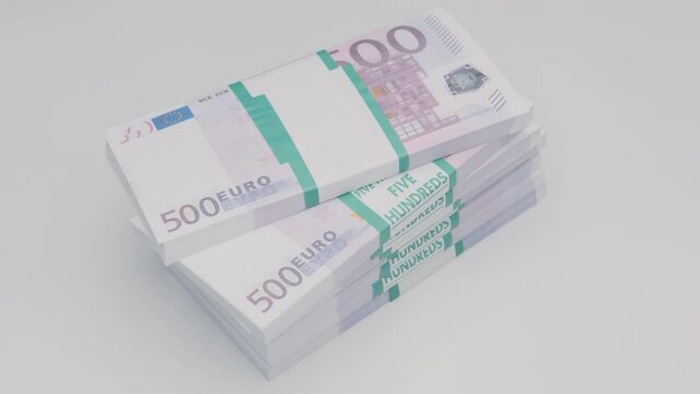 stack of bank of five hundred euro bills rotating on white background.