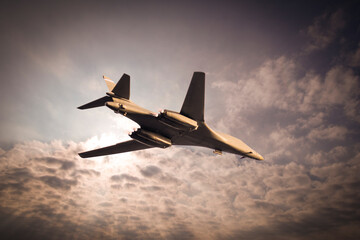 Strategic bomber fighter airplane flying in the cloudy sky