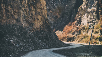 Dirt road through a mountain gorge