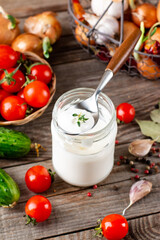 Yogurt in glass bottles on a table