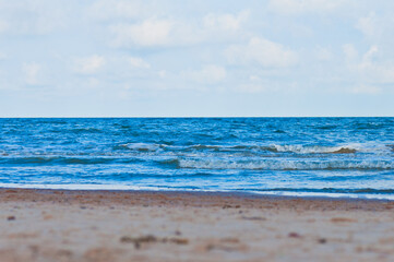 Clean sand beach and blue sky and sea