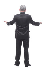 Man standing giving his back to the camera isolated over a white backgroud