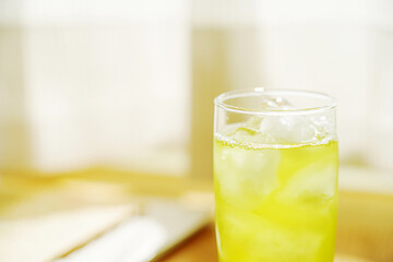 Ice in a glass and cold tea