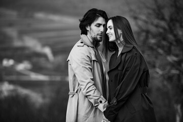 Beautiful sensual portrait of young stylish couple in love. Image of adorable brunette couple in love. Happy family.