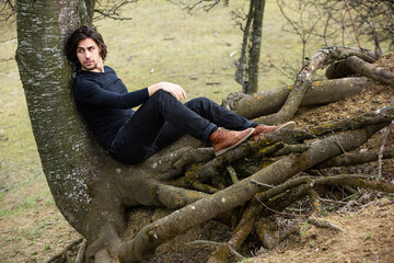 Beautiful sensual portrait of young stylish couple in love. Image of adorable brunette couple in love. Happy family.