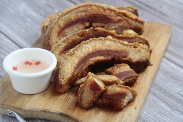 Freshly cooked Filipino food called Bagnet or deep fried crispy pork belly