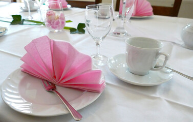Coffee cover with white crockery and pink decoration for wedding or birthday