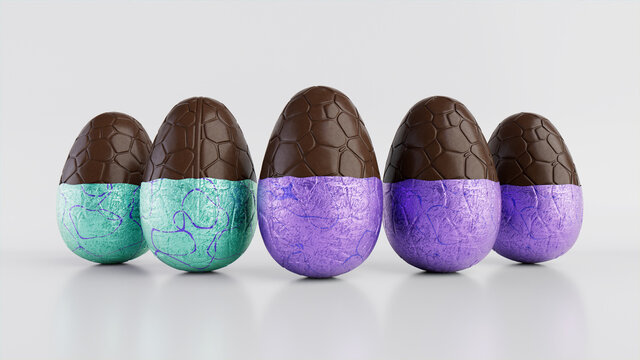 Easter Eggs isolated against a white background. Partially unwrapped Chocolate Eggs with patterned Purple and Aqua foil. 3D Render