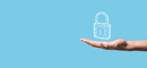 Male hand holding a lock padlock icon.Cyber security network. Internet technology networking.Protecting data personal information on tablet. Data protection privacy concept. GDPR. EU.Banner