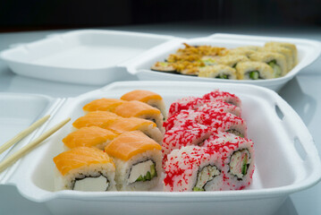 sushi rolls in lunchboxes, philadelphia and california