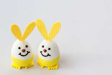 Easter holiday concept with cute handmade eggs, bunny, chicks