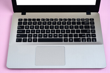 Flat Lay of minimalist silver laptop with white display for copy space