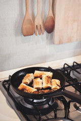 Frying Spring Rolls In A Pan