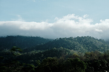 Obraz premium clouds over the mountains with blue sky