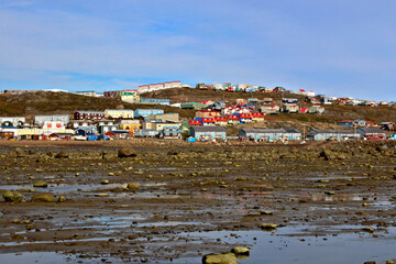 Iqaluit skyline at low tide in Nunavut, Canada © Bill Glass