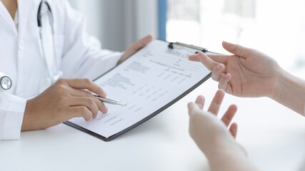 Patients explain their symptoms to the doctor, Specialist doctors advise and examine the history of...