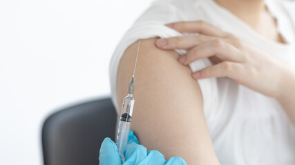 Vaccination, Doctor is vaccinating the patient with antibiotics or virus-resistant antibiotics to prevent the spread of the virus, Antibiotics prevent new strain of flu concept.