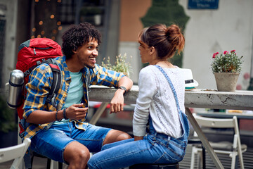 Friends having a pleasant talk at the bar's backyard. Quality friendship time together. Travel,...